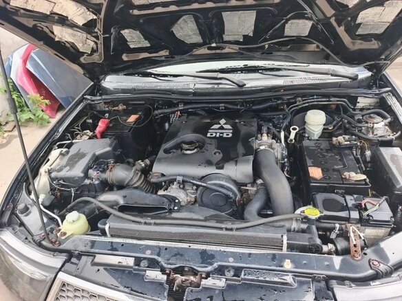 2011 Mitsubishi L200 IV, чёрный - вид 9