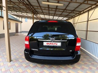 2009 Kia Carnival II, чёрный, 900000 рублей, вид 2