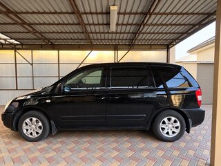 2009 Kia Carnival II, чёрный, 900000 рублей, вид 3