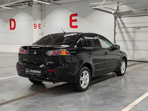 2010 Mitsubishi Lancer X, чёрный - вид 4