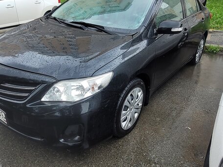 2011 Toyota Corolla X (E140, E150) Рестайлинг, чёрный, 900000 рублей, вид 1