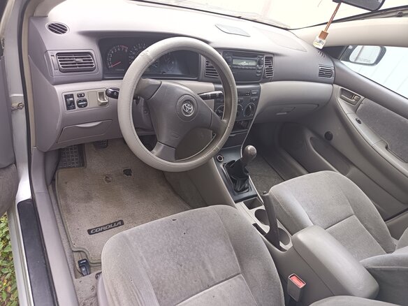 2003 Toyota Corolla IX (E120, E130), серебристый, 500000 рублей - вид 4