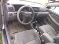 2003 Toyota Corolla IX (E120, E130), серебристый, 500000 рублей - вид 4