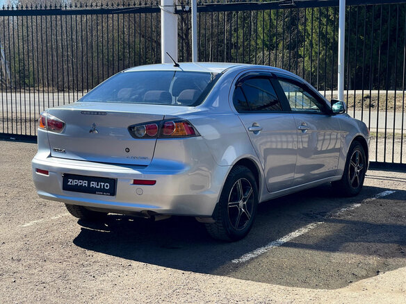 2011 Mitsubishi Lancer X Рестайлинг, серебристый, 629000 рублей - вид 4