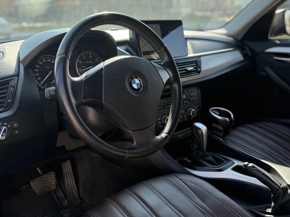 2013 BMW X1 18i I (E84) Рестайлинг, коричневый, 1350000 рублей - вид 9