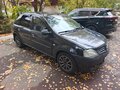 2009 Renault Logan I, чёрный - вид 1