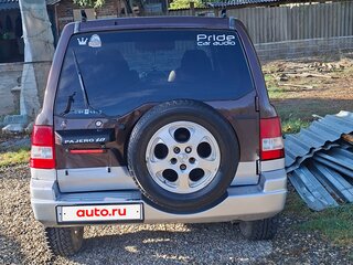1999 Mitsubishi Pajero iO, коричневый, 390000 рублей, вид 4