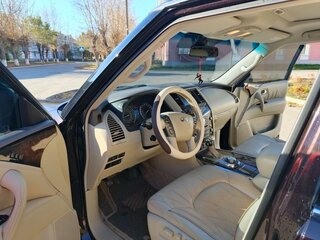 2012 Infiniti QX56 II, пурпурный, 2150000 рублей, вид 5