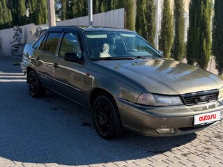 2003 Daewoo Nexia I, коричневый, 145000 рублей, вид 3
