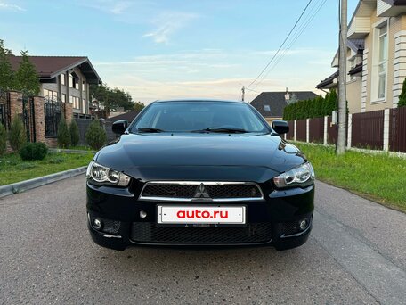 2012 Mitsubishi Lancer X Рестайлинг, чёрный, 669000 рублей, вид 2