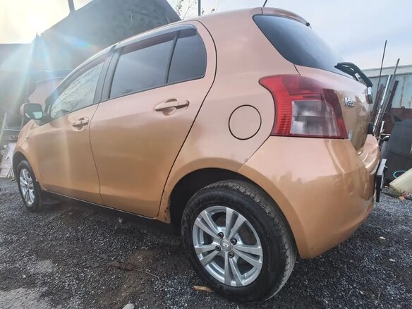 2005 Toyota Vitz II (XP90), оранжевый, 510000 рублей - вид 8