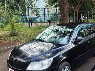 2011 Skoda Octavia II (A5) Рестайлинг, чёрный, 850000 рублей, вид 1