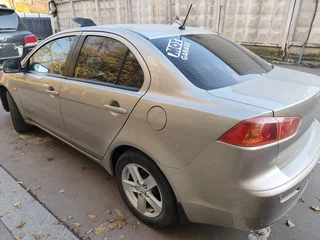 2008 Mitsubishi Lancer X, бежевый, 805000 рублей, вид 5