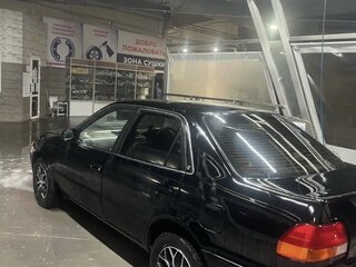1996 Toyota Corolla VII (E100), чёрный, 170000 рублей, вид 4