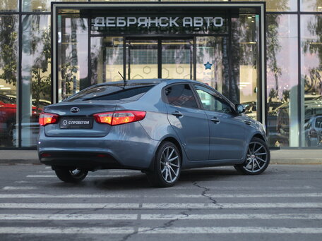 2013 Kia Rio 4-speed III, голубой, 830000 рублей, вид 3