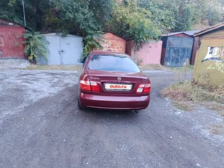 2004 Nissan Almera II (N16) Рестайлинг, красный, 300000 рублей, вид 4