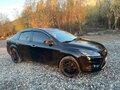 2009 Ford Focus II Рестайлинг, чёрный, 460000 рублей - вид 1