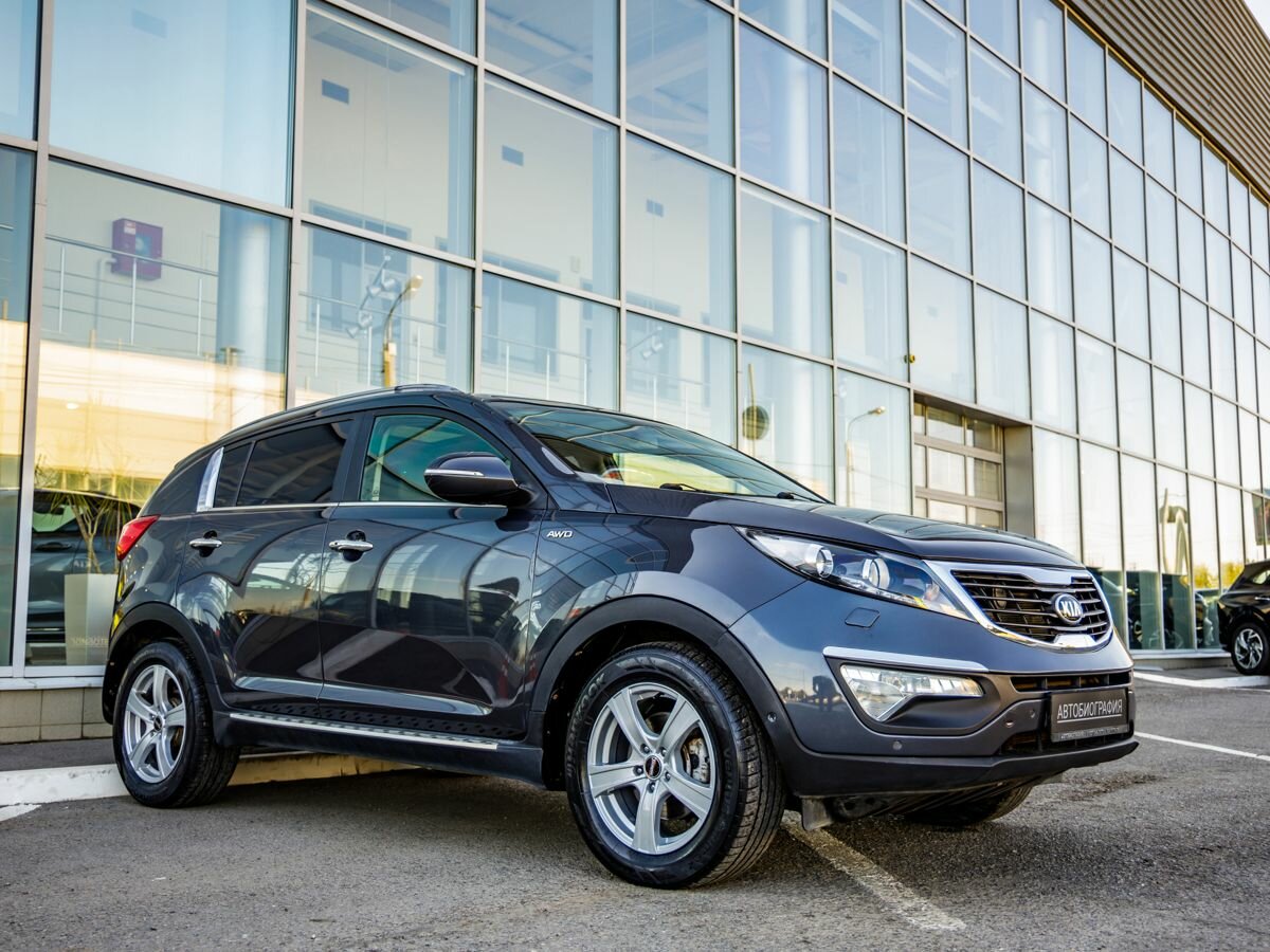 Открыть фотографии: Kia Sportage III