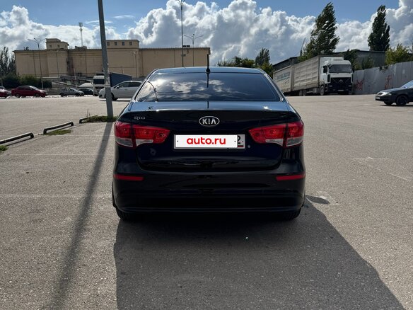 2013 Kia Rio 4-speed III, чёрный, 949000 рублей - вид 4