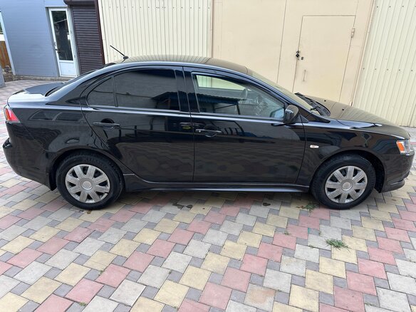2012 Mitsubishi Lancer X Рестайлинг, чёрный, 650000 рублей - вид 3