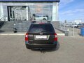2010 Kia Carens II (UN), коричневый, 740000 рублей - вид 5