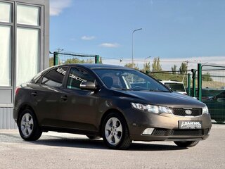 2009 Kia Cerato 4-speed II, коричневый, 715000 рублей, вид 4