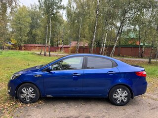 2012 Kia Rio 4-speed III, синий, 720000 рублей, вид 4