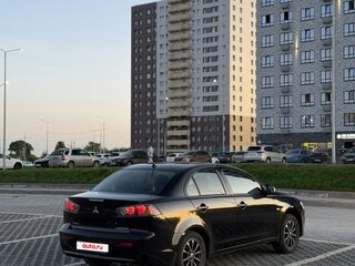 2012 Mitsubishi Lancer X Рестайлинг, чёрный, 663000 рублей, вид 5