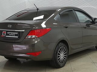 2015 Hyundai Solaris I Рестайлинг, коричневый, 949000 рублей, вид 5