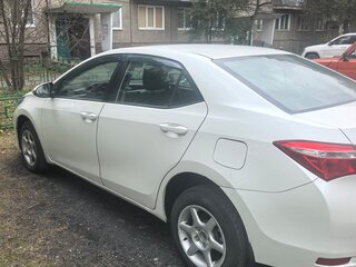 2013 Toyota Corolla XI (E160, E170, E180), белый, 950000 рублей, вид 4