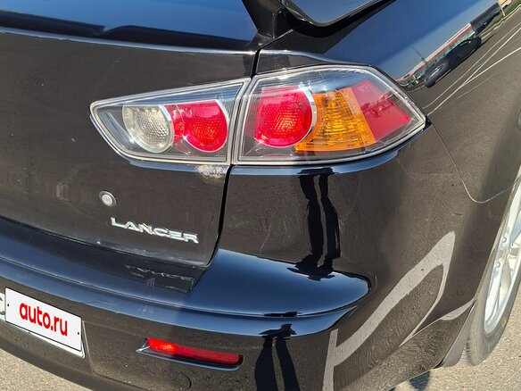 2010 Mitsubishi Lancer X, чёрный, 629000 рублей - вид 6