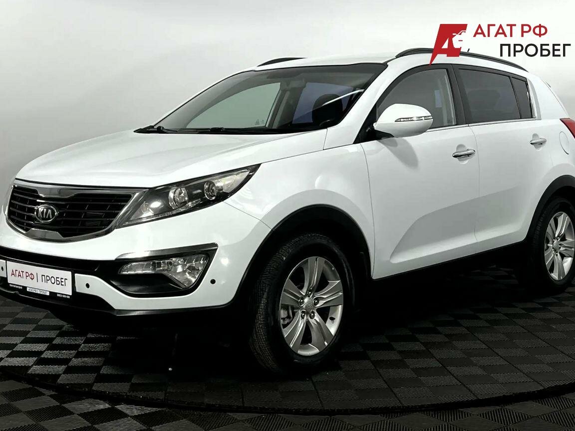 Открыть фотографии: Kia Sportage III