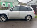 2013 Chery Tiggo (T11) I Рестайлинг (FL), серебристый - вид 2