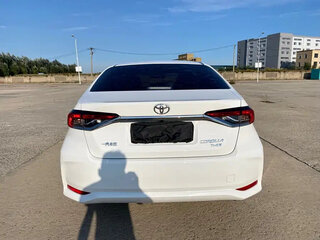 2022 Toyota Corolla XII (E210), белый, 1500001 рублей, вид 4