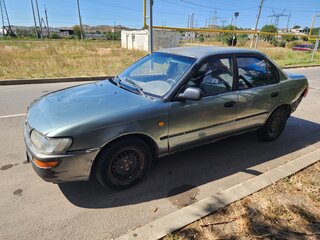 1993 Toyota Corolla VII (E100), серый, 70000 рублей, вид 1