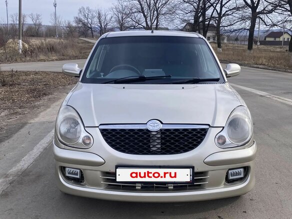 2002 Toyota Duet, серый