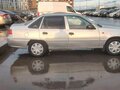 2009 Daewoo Nexia I Рестайлинг, серебристый - вид 2