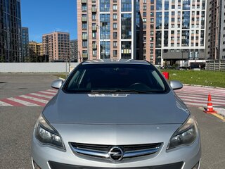 2012 Opel Astra J Рестайлинг, серебристый, 700000 рублей, вид 2
