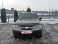 2016 Chevrolet Niva I Рестайлинг, серый, 670000 рублей - вид 1