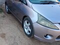 2007 Mitsubishi Grandis I, фиолетовый, 650000 рублей - вид 2