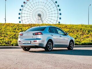 2010 Mitsubishi Lancer X, серебристый, 720000 рублей, вид 2