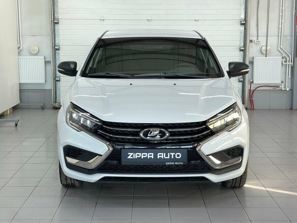 2024 Lada (ВАЗ) Vesta I Рестайлинг (NG), белый, 999000 рублей - вид 1