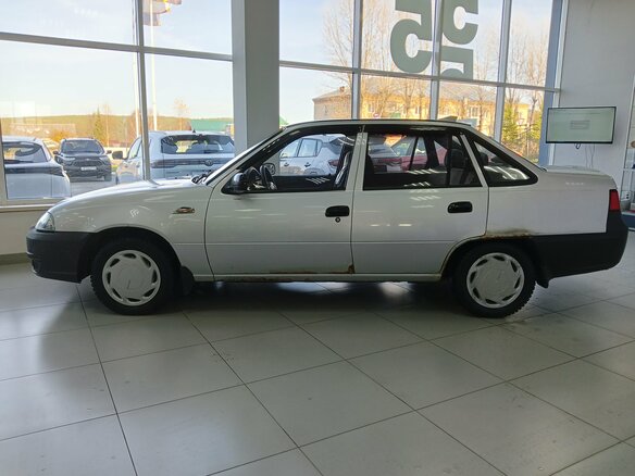 2011 Daewoo Nexia I Рестайлинг, серебристый, 170000 рублей - вид 8
