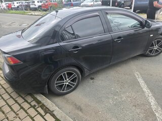 2012 Mitsubishi Lancer X Рестайлинг, чёрный, 799000 рублей, вид 4