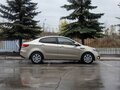 2015 Kia Rio III Рестайлинг, бежевый - вид 7