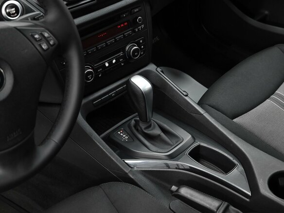 2011 BMW X1 18i I (E84), коричневый - вид 7