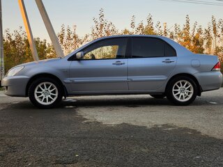 2005 Mitsubishi Lancer IX Рестайлинг, серебристый, 310000 рублей, вид 4