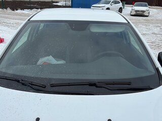 2024 Lada (ВАЗ) Vesta I Рестайлинг (NG), белый, 923000 рублей, вид 4