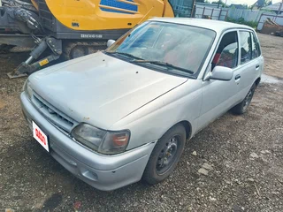 1995 Toyota Starlet IV (P80), серый, 230000 рублей, вид 2