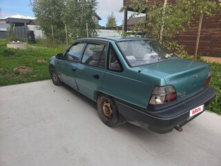 1999 Daewoo Nexia I, зелёный, 75000 рублей, вид 4